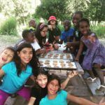 kids outside smiling